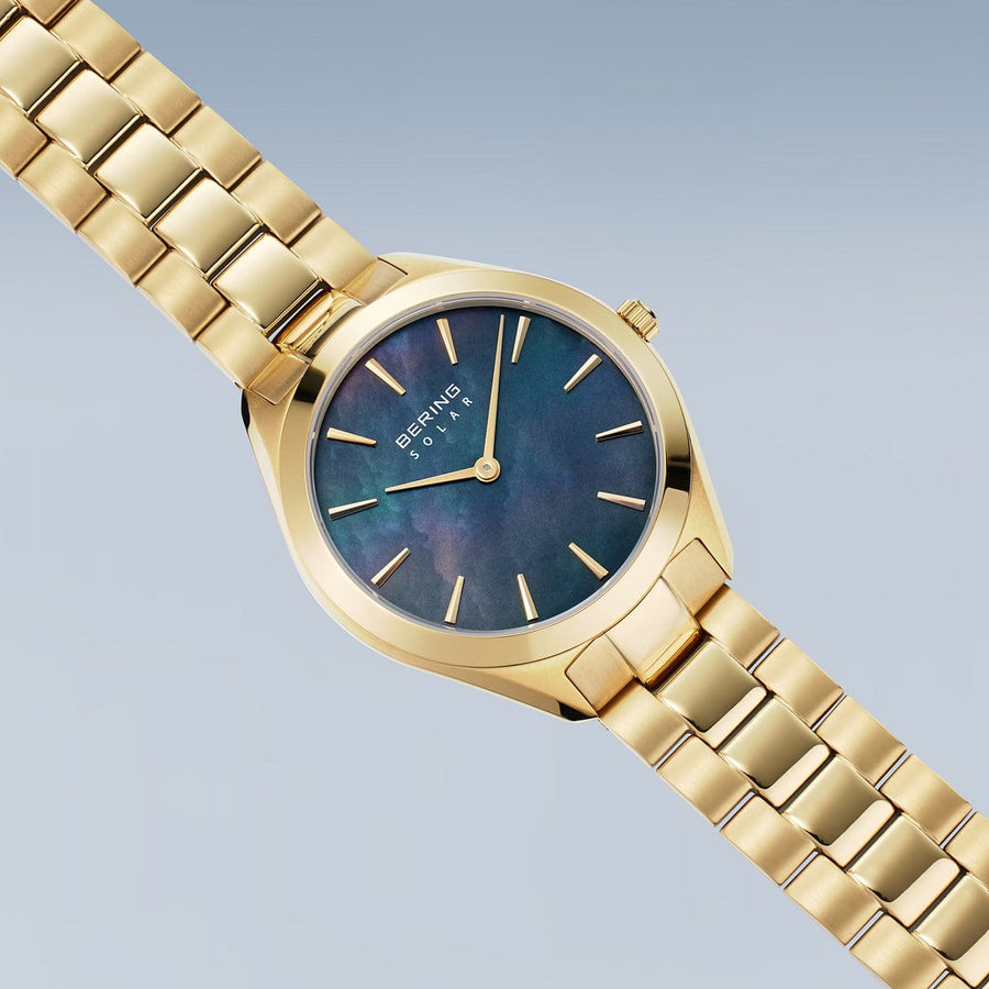 Bering Gold Plated Ladies Dark Mother-of-Pearl Dial Solar Watch