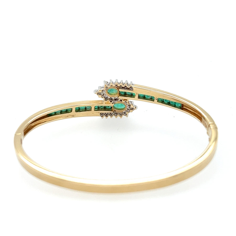 Previously Owned 14ct Yellow Gold Emerald & Diamond Crossover Bangle