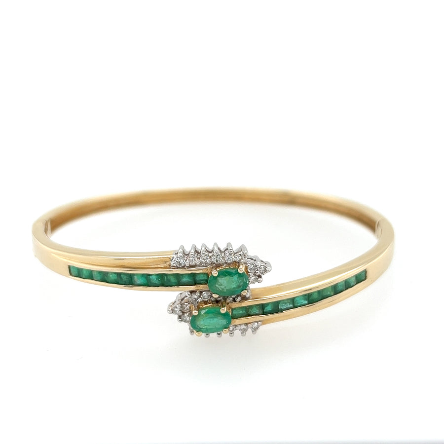 Previously Owned 14ct Yellow Gold Emerald & Diamond Crossover Bangle